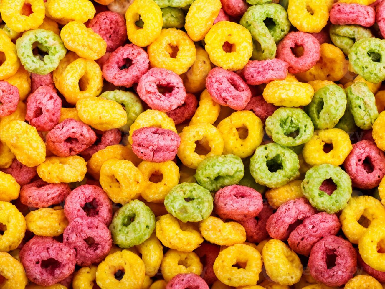 colorful cereal rings isolated on white background photo