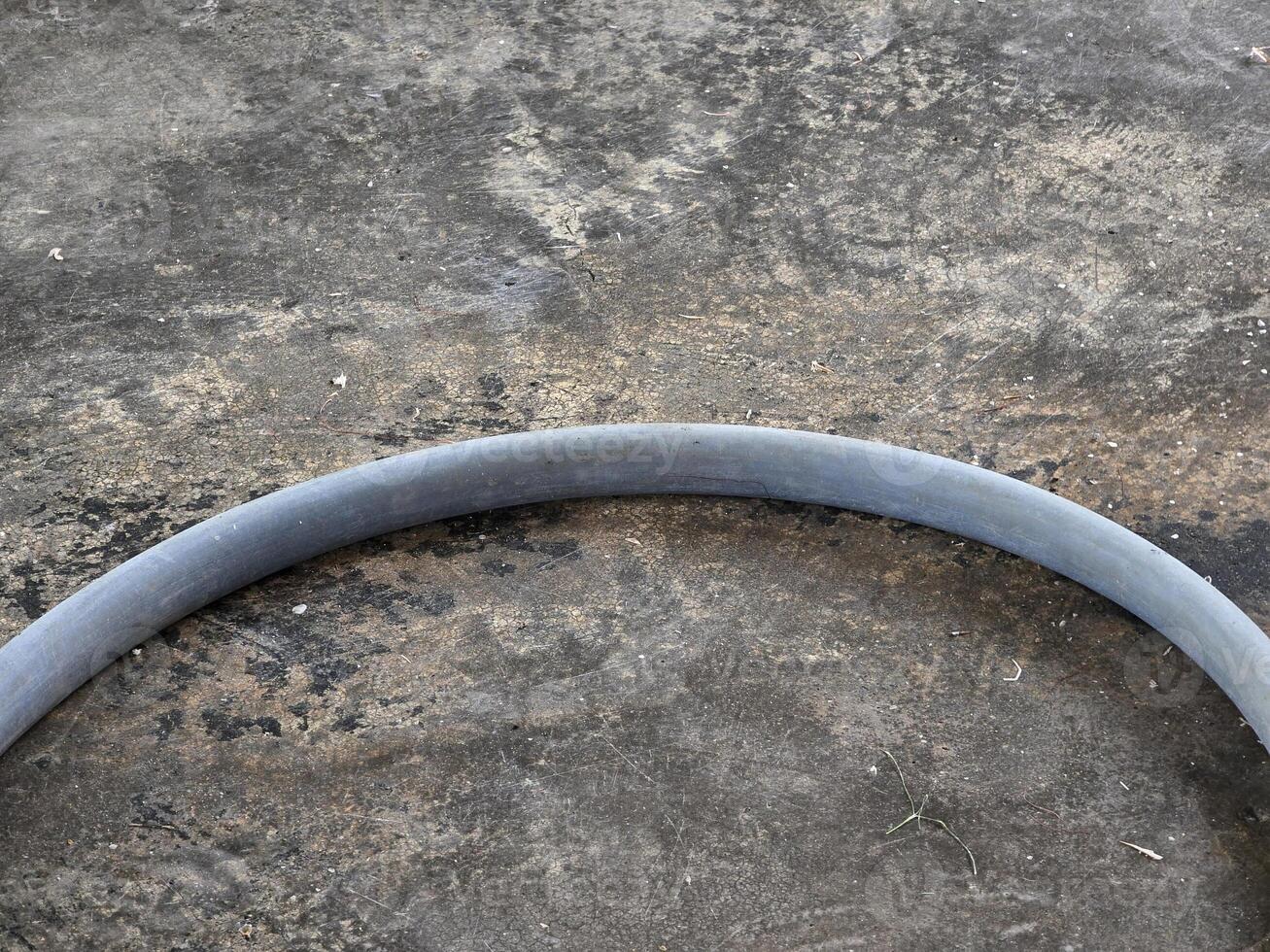 hose on cement floor photo