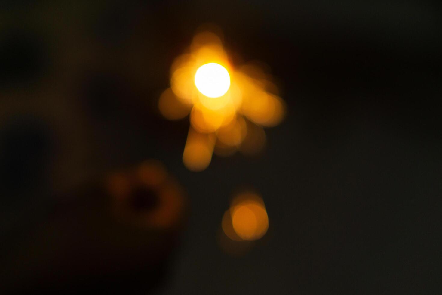 An abstract blurry background of firework in night for new year event photo