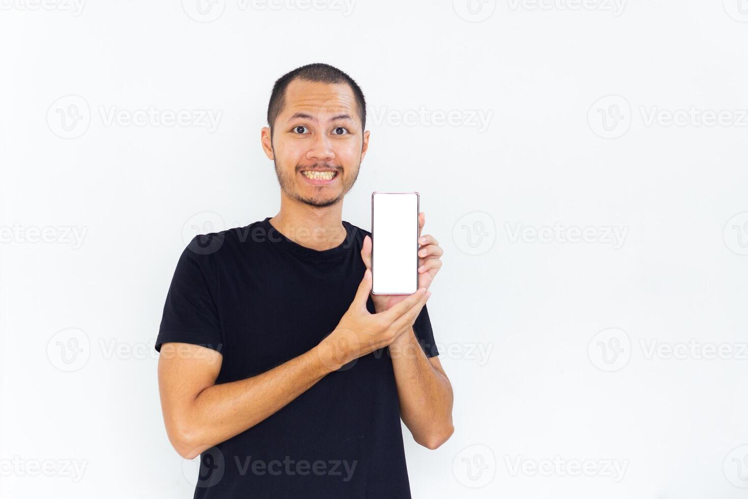Men showing blank screen smartphone with black empty shirt on isolated white background photo