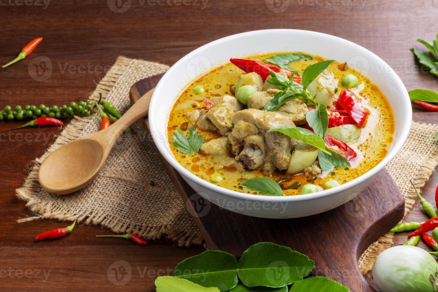 Chicken Green Curry or pork Asian food Thai food on a bowl of soup with a mixture of herbs, vegetables and pepper spices. photo