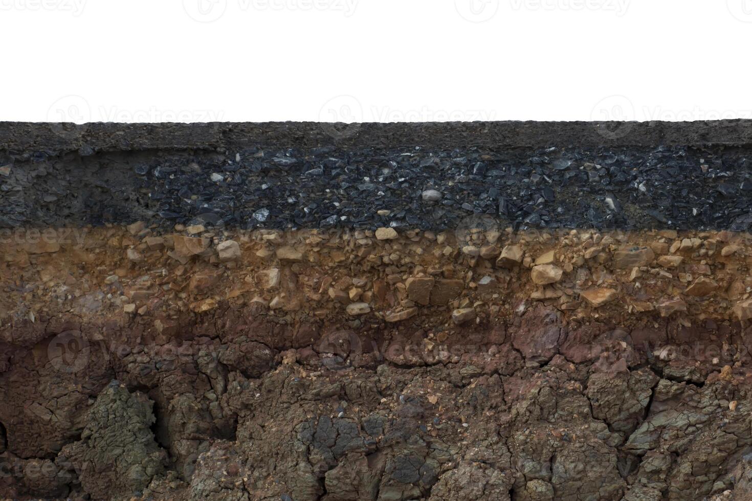 The layer of asphalt with soil and rock. Un-focus image. photo