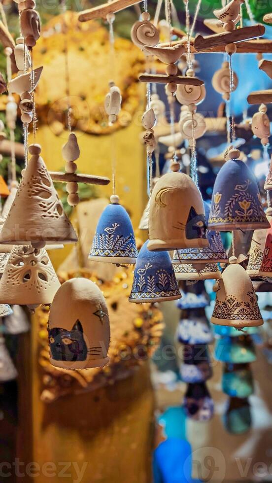 Handcrafted Blue and Beige Ceramic Bells with hand-painted print photo