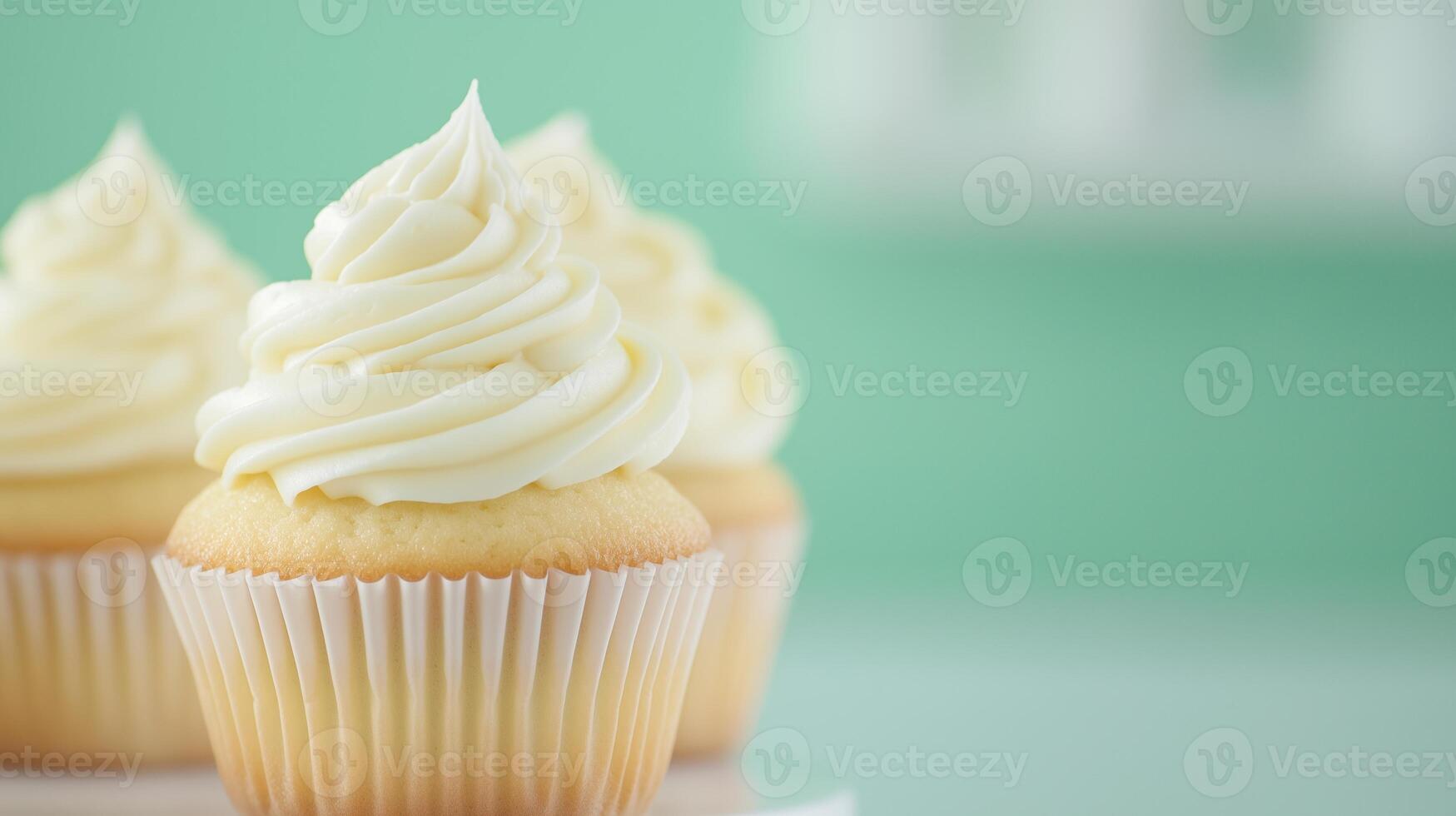 Freshly Baked Vanilla Cupcakes With Creamy Frosting on a Soft Pastel Green Background Perfect for Bakery Menus and Spring Celebrations photo