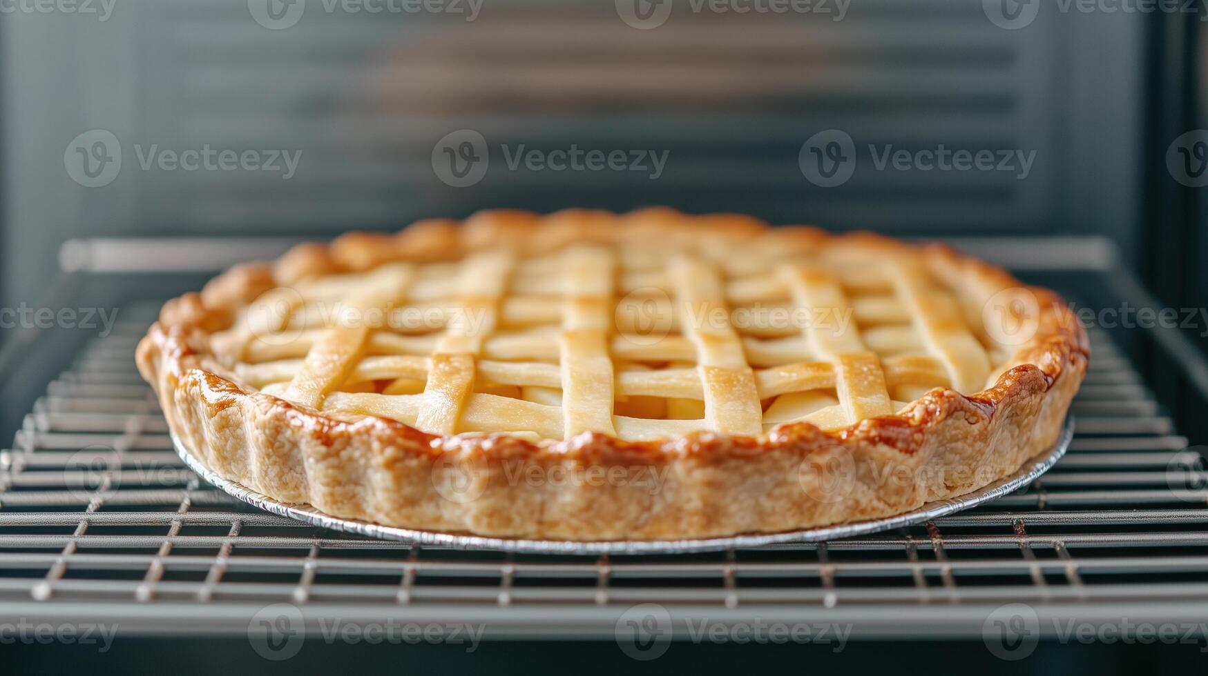 Golden Brown Homemade Pie Baking in Oven With Crispy Lattice Crust and Sweet Aroma, Capturing Freshly Baked Dessert Perfection, Ideal for Culinary Blogs, Recipes, and Cozy Kitchen Scenes photo