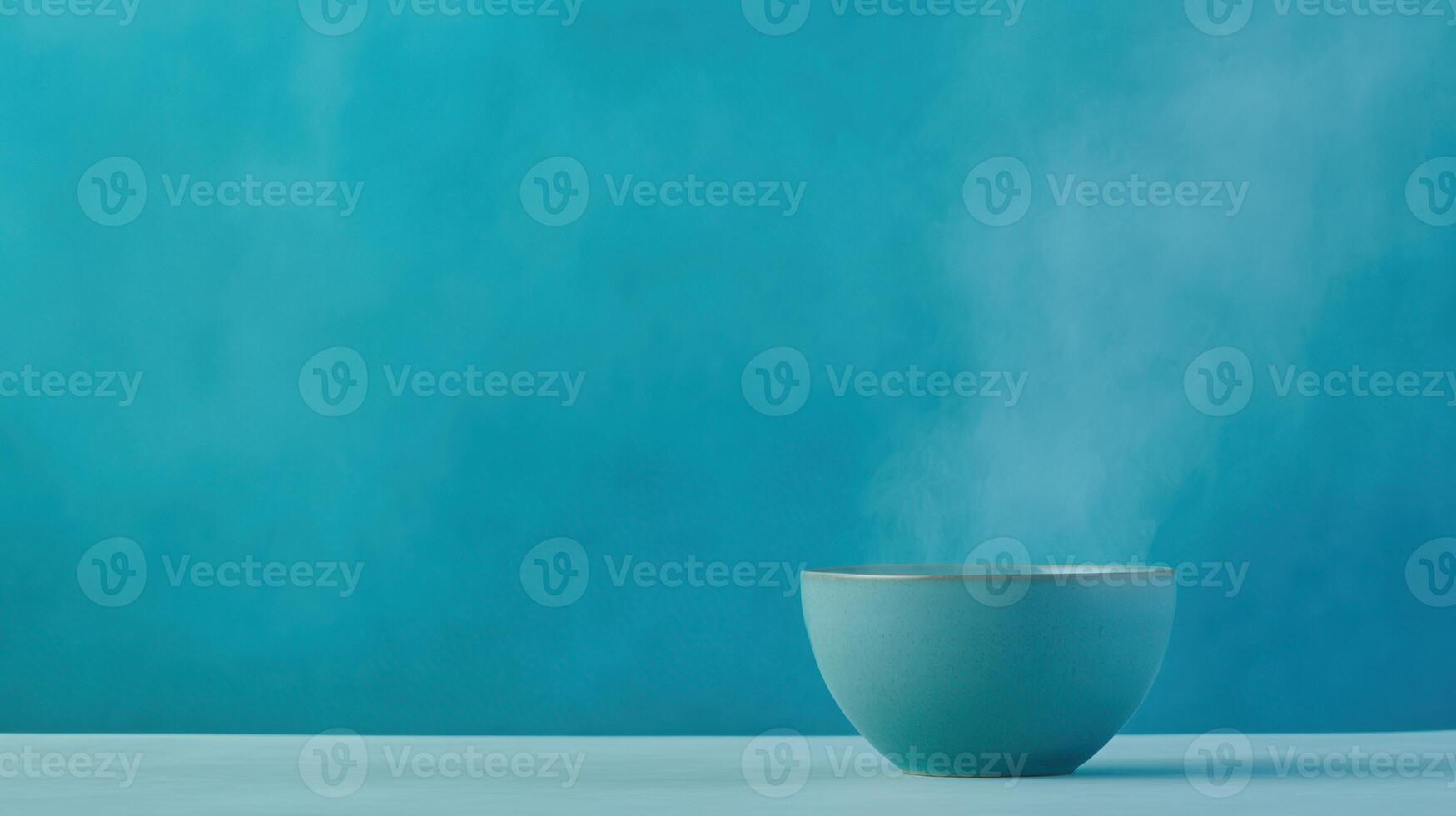 Porcelain Dye Workshop Featuring a Minimalist Green Screen Backdrop with Ceramic Bowl and Emanating Steam for Contemporary Design and Conceptual Art photo
