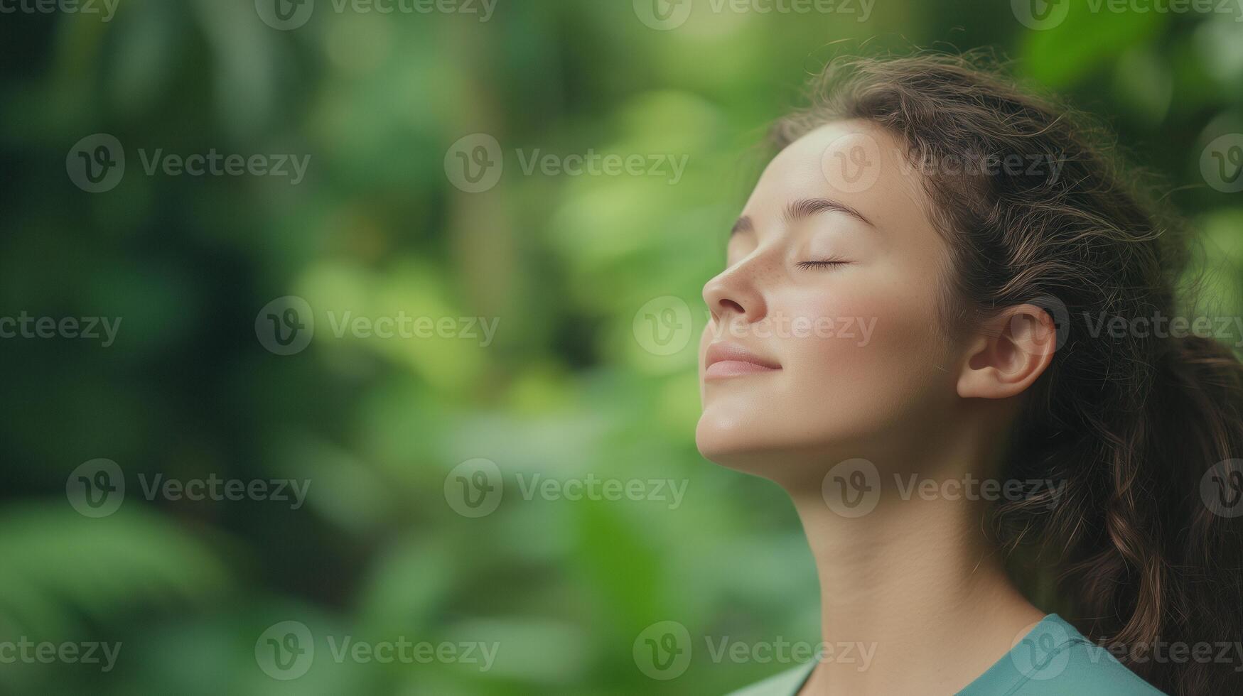 Young Woman Breathing Deeply in Lush Green Nature Background Reflecting Serenity, Relaxation, and Mindfulness in a Peaceful Portrait Emphasizing Connection with Nature and Environmental Harmony photo
