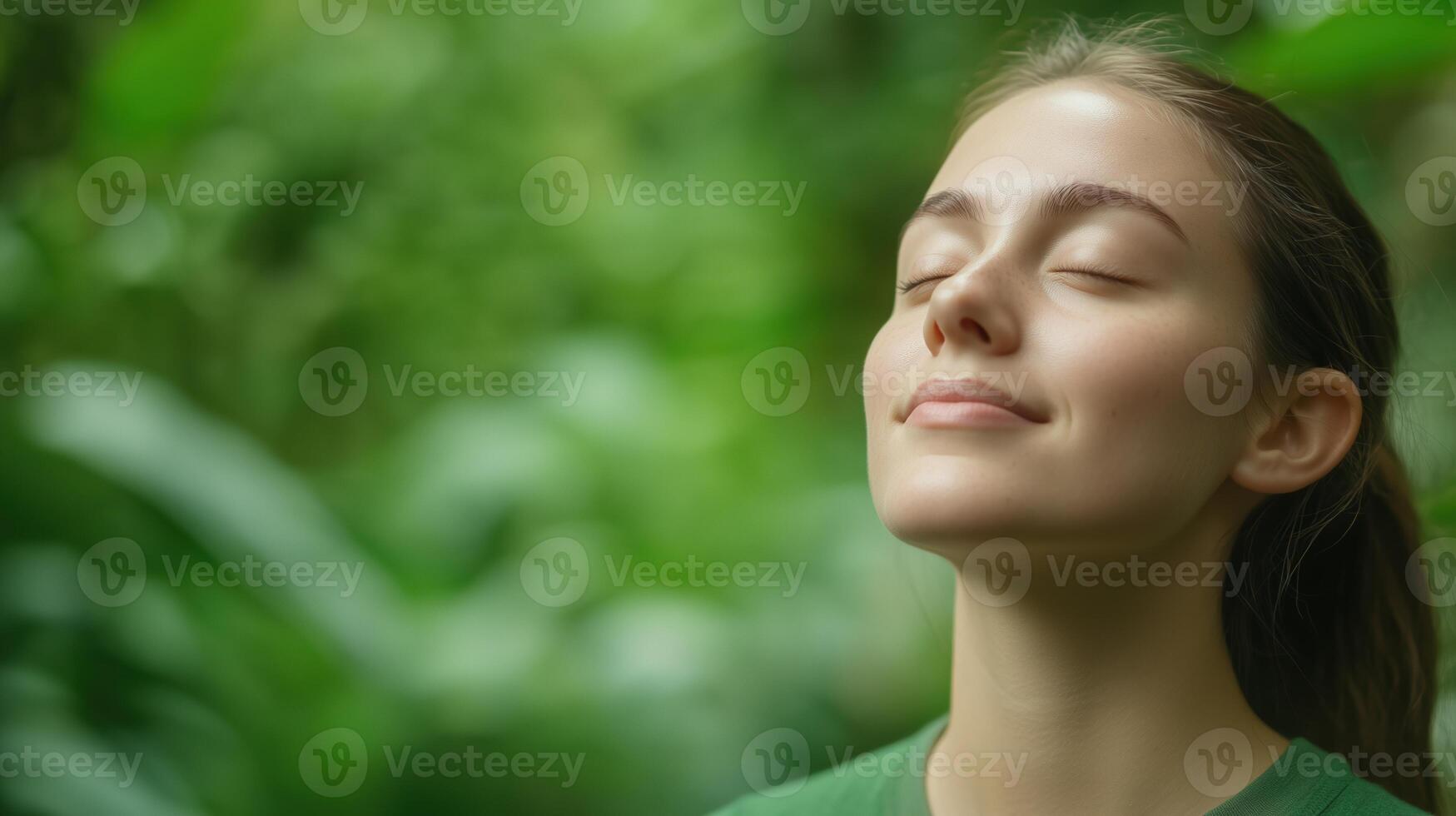 Young Woman Enjoying Nature with Eyes Closed in Lush Greenery for Relaxation and Mindfulness Concept photo