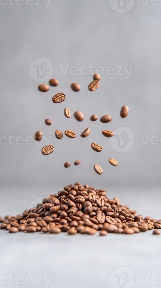Dynamic Slow Motion Probe Lens View of Coffee Beans Bouncing and Falling on Pile Against Gray Background with Shallow Depth of Field and Soft Lighting photo