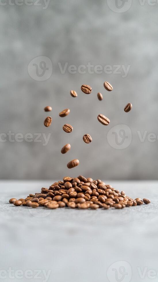 Bouncing Coffee Beans in Super Slow Motion Close Up with Probe Lens Against Gray Background photo