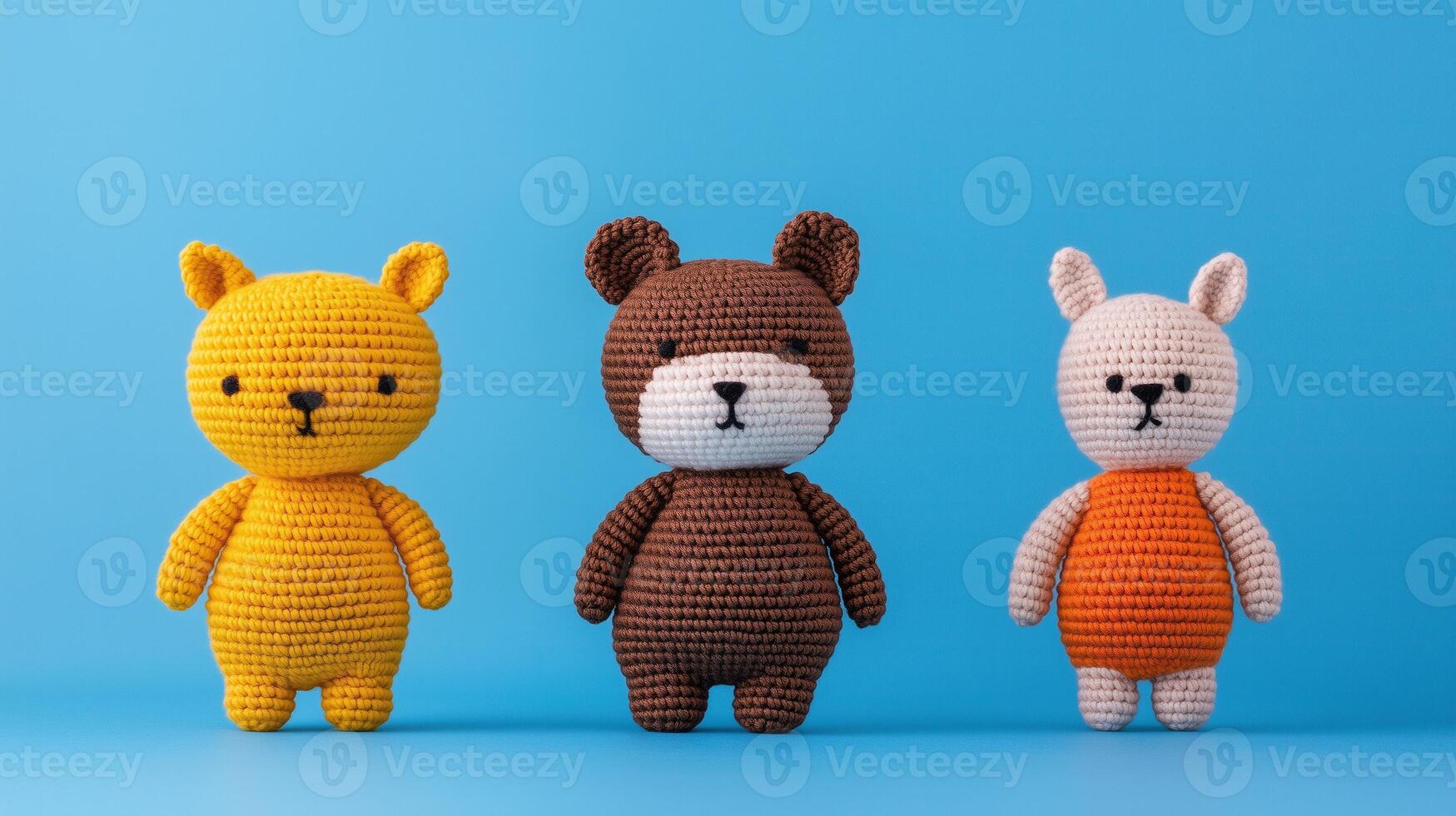 Amigurumi Style Minimalist Crochet Animals on Blue Background Comprising Bear, Rabbit, and Cat in Pastel Colors With Focus on Craftsmanship, Childlike Charm, and Simple Geometric Forms photo