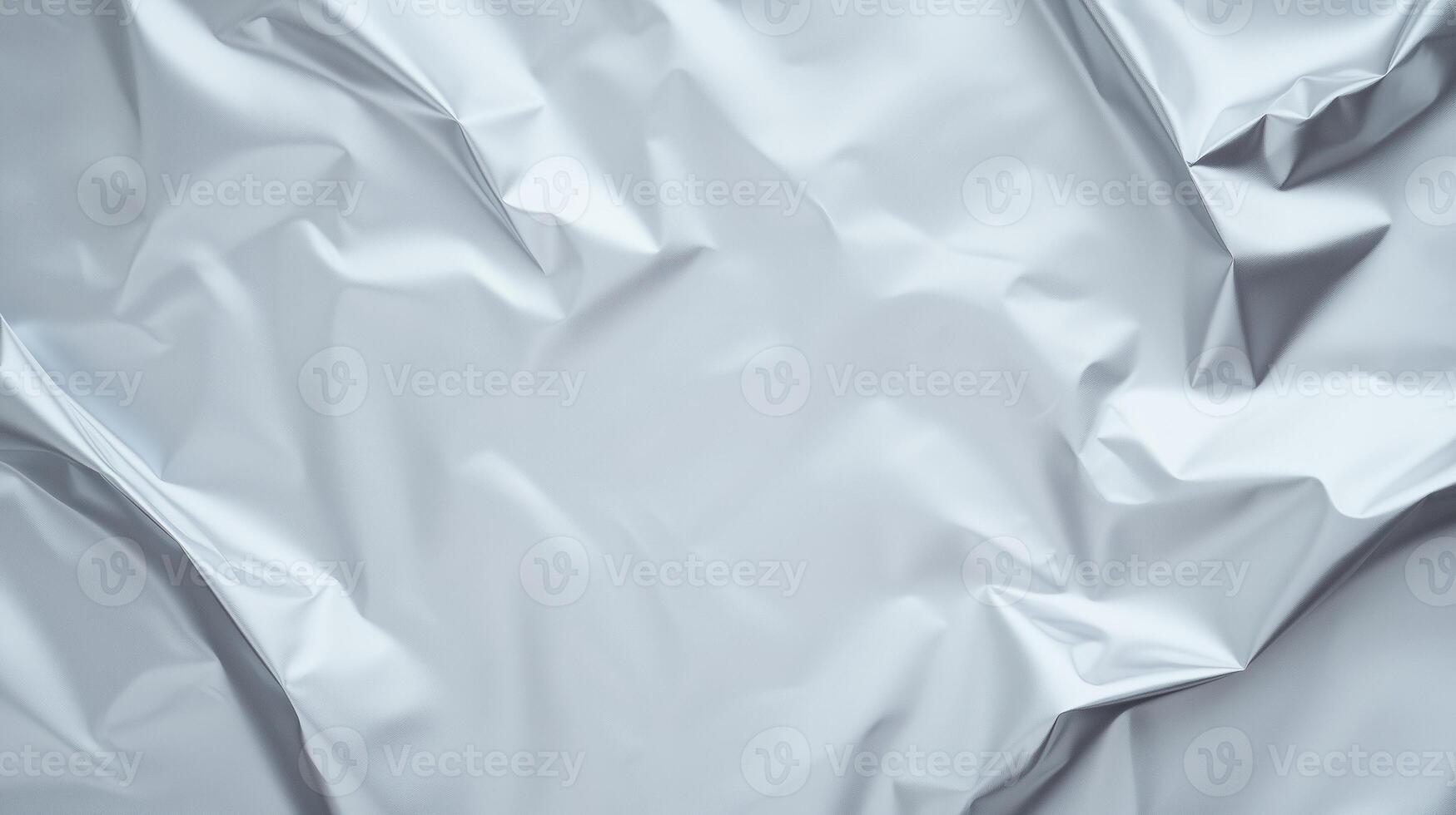Wrinkled silver metallic surface texture with reflective folds. Abstract background for creative design and print photo