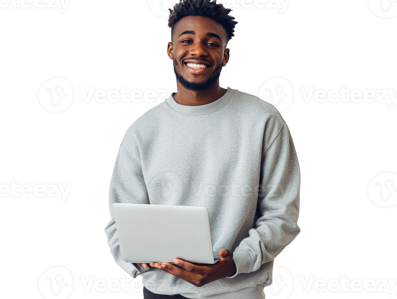 Young man smiles while holding laptop in studio png