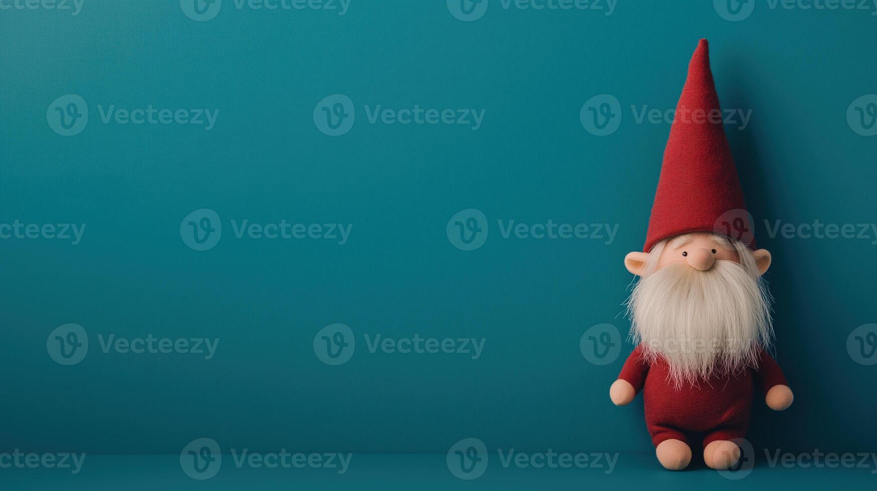 Christmas gnome with red hat and white beard on a teal background. Festive decoration. Horizontal composition with copy space for design and print photo