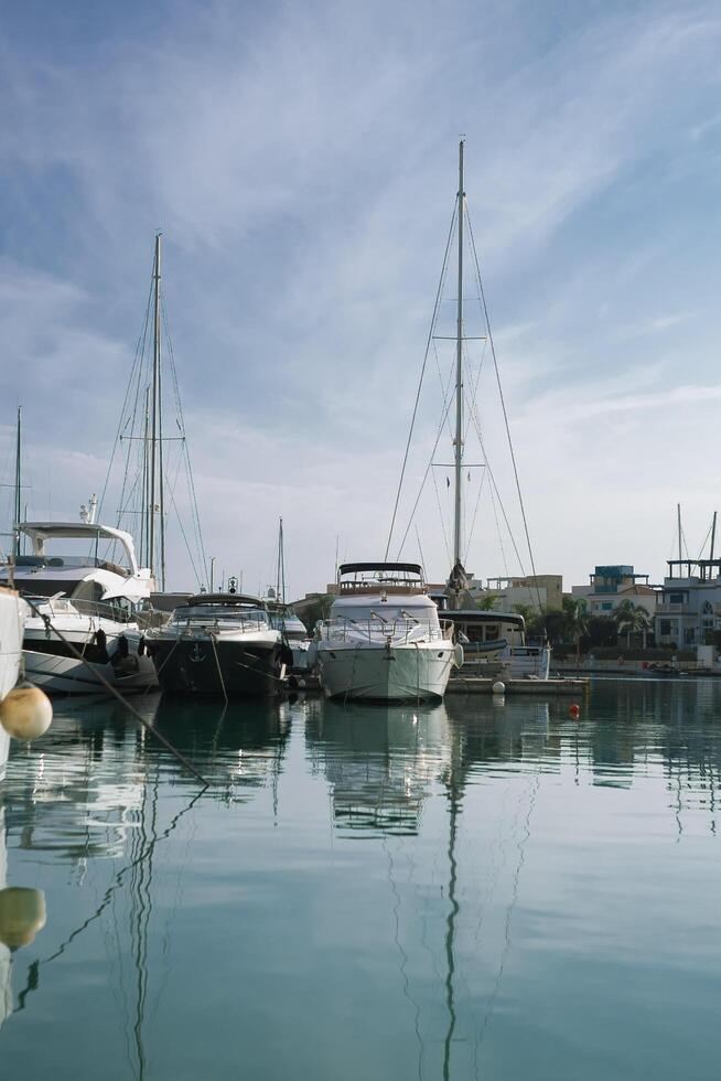 Paphos,Cyprus November,4 2023. View of Harbor and marina with moored yachts and motorboats photo