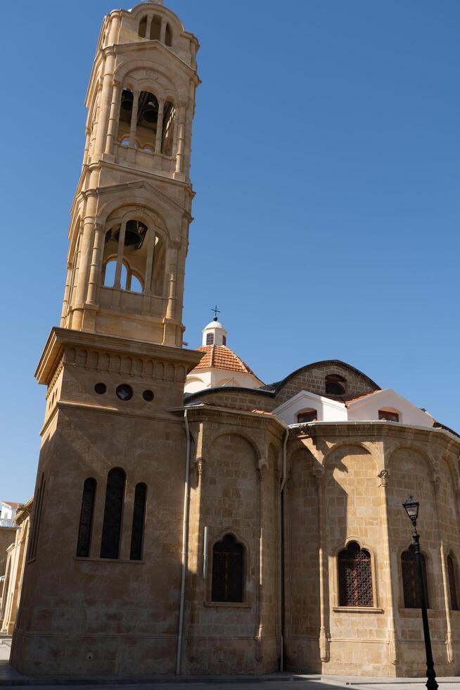 Nicosia,Cyprus - November 03, 2023. Bell tower a part of monastery in the southwest of the island. An important Orthodox pilgrimage site. photo