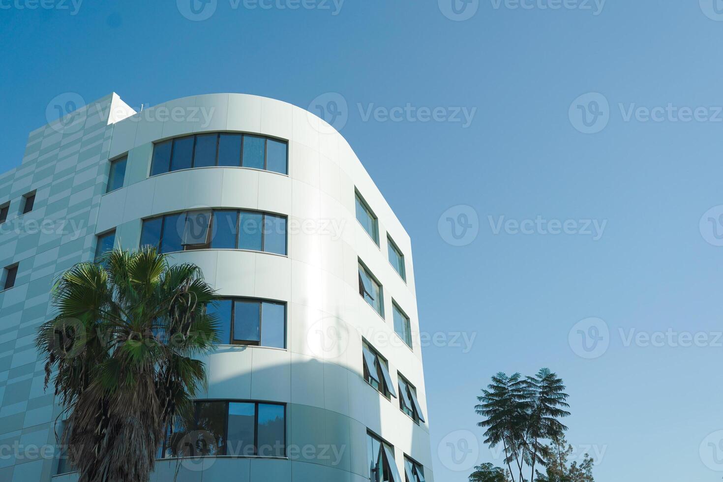 New building architecture on blue sky background,Low angle architectural exterior view of modern,copy space foe text photo
