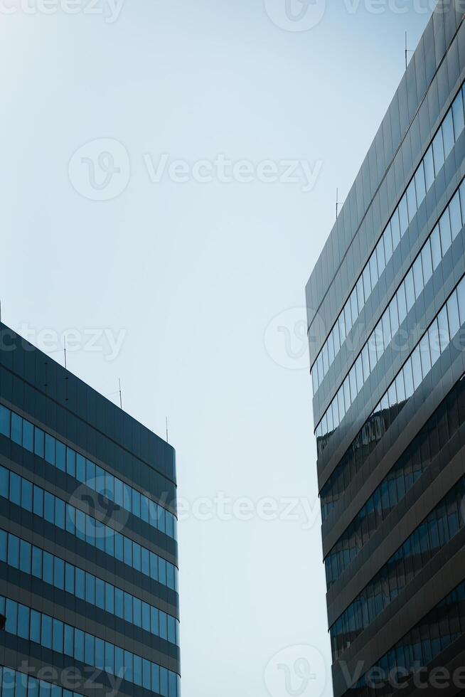 New building architecture on blue sky background,Low angle architectural exterior view of modern,copy space for text photo