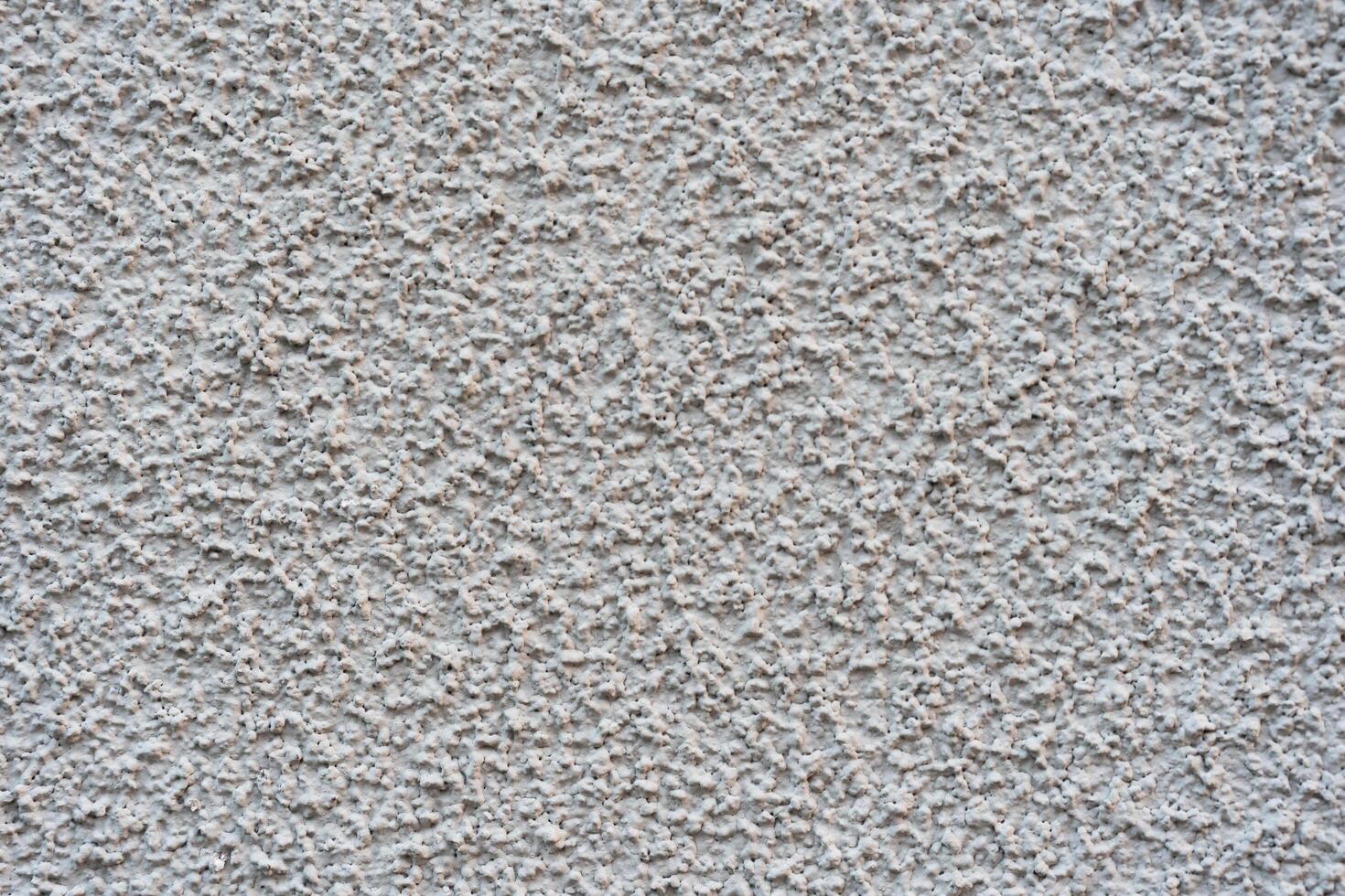 white mortar wall background. Stone plastered stucco wall. Color gray grunge cement backgrounds. Raw concrete texture. top view. photo