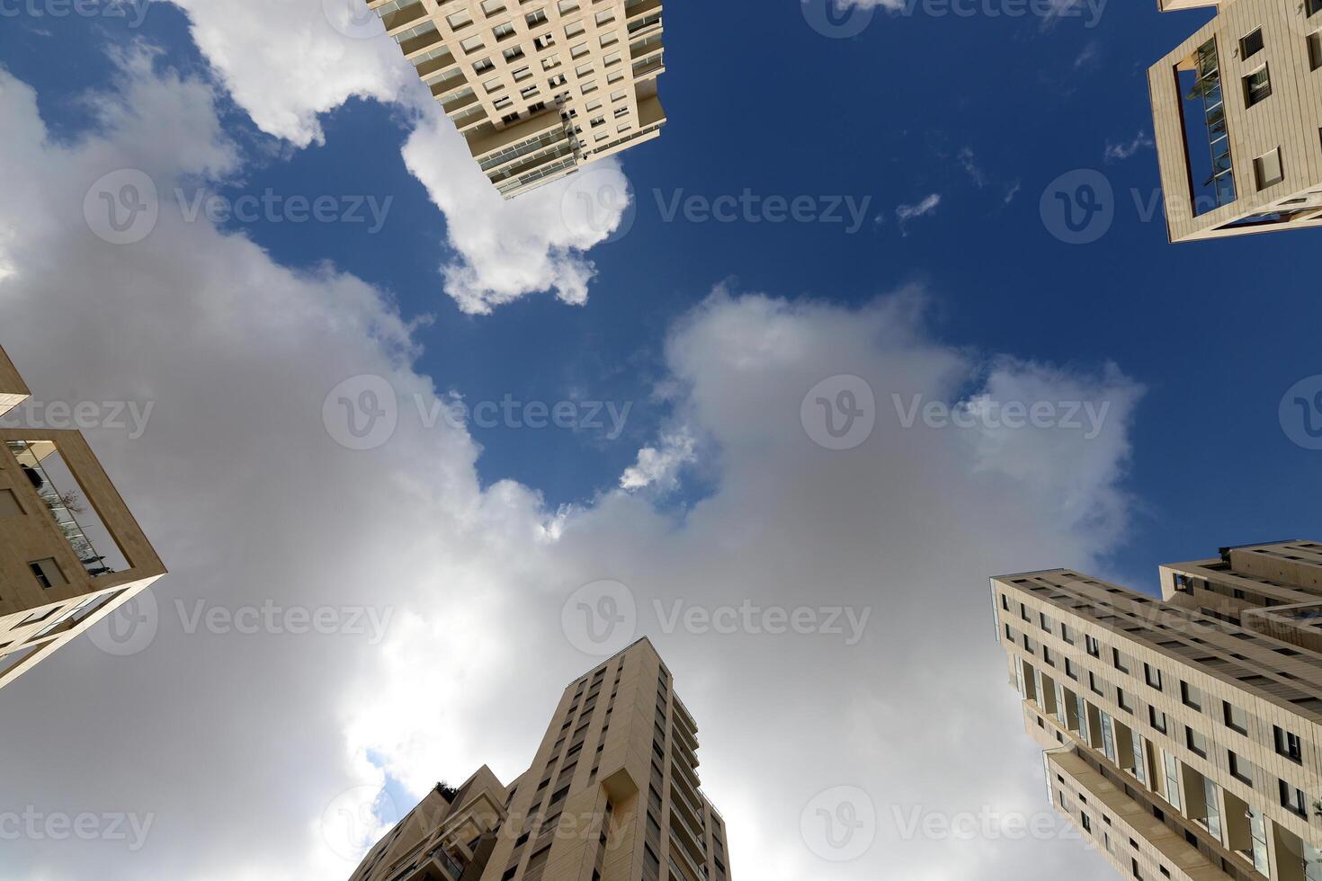 white clouds are floating across the sky photo