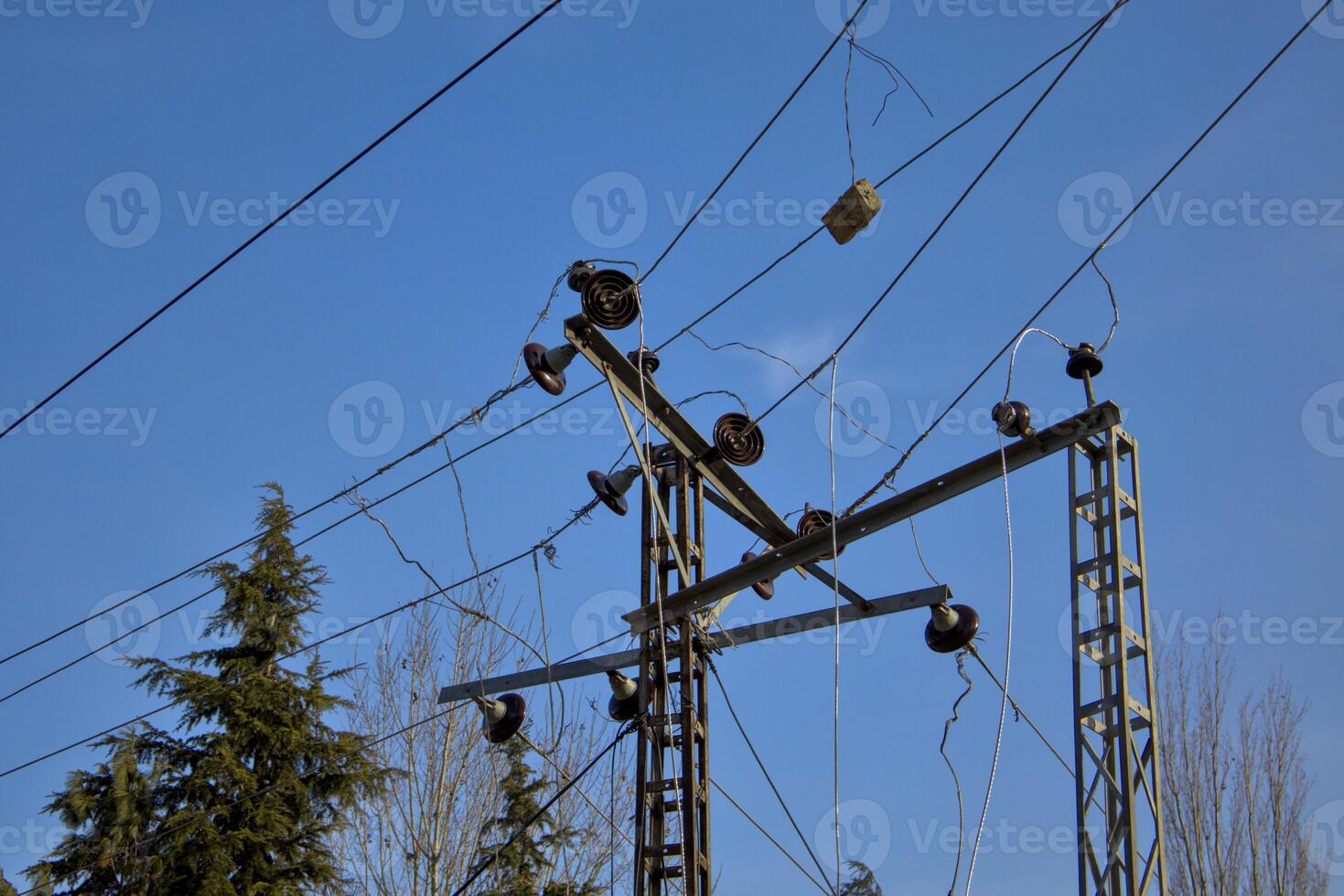 Damaged Utility Pole with Broken Power Line photo