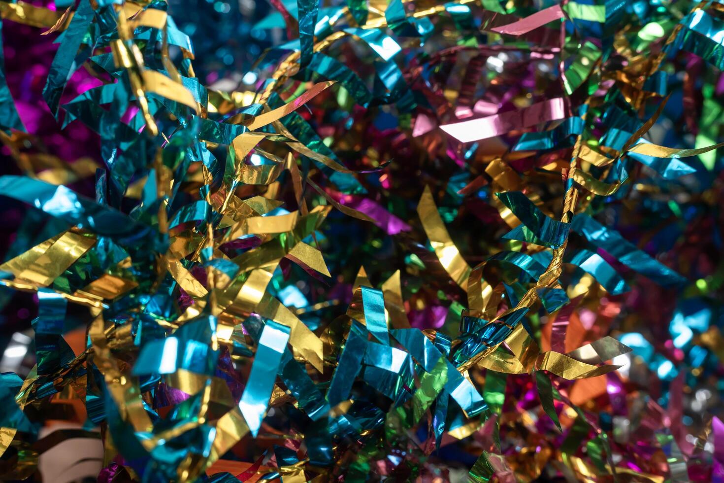 Colorful tinsel background for festive and holiday celebrations photo