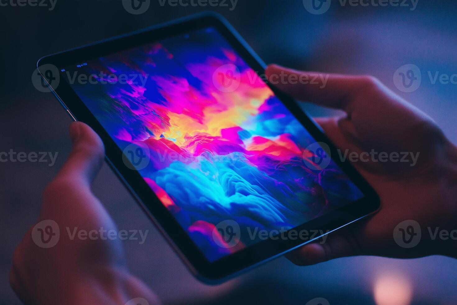 Tablet displaying vibrant pattern with soft background lighting photo