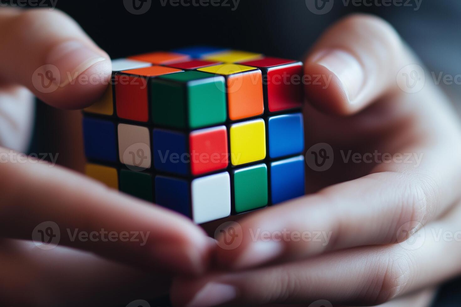 Partially Solved Rubik's Cube in Hand Close-Up photo