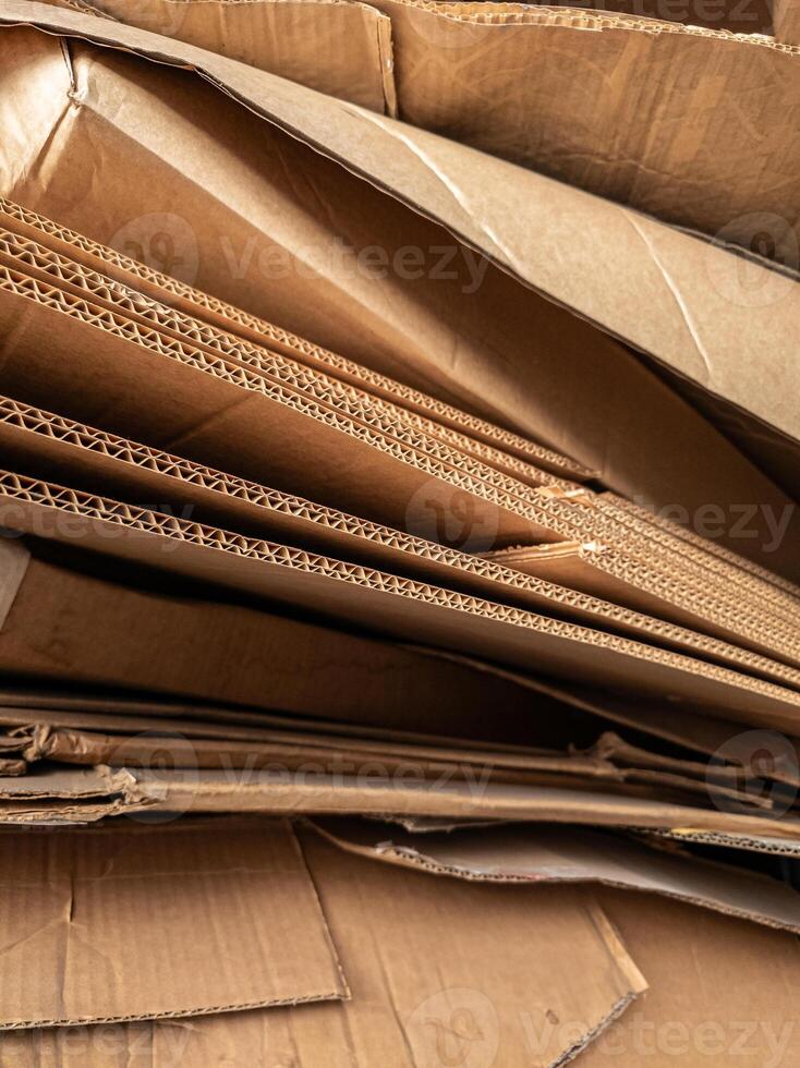 Close-up view of stacked corrugated cardboard layers, showcasing the intricate wave structure and texture, ideal for concepts like packaging, recycling, industry, and material design photo