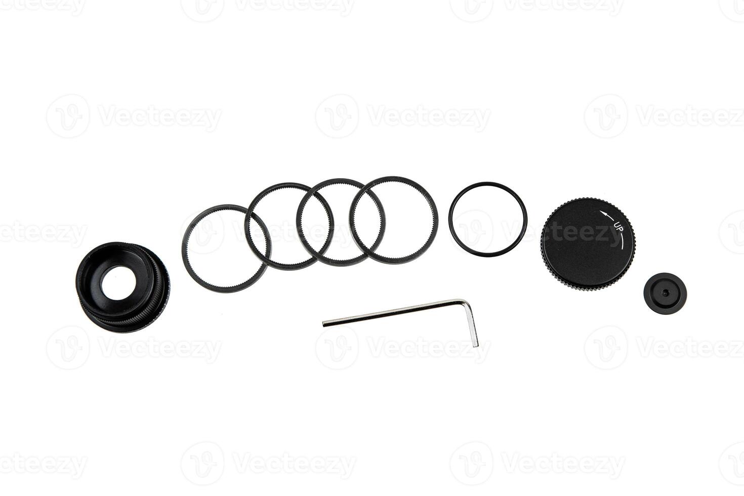 Special set of rings for adjusting an optical sight, including various sized rings, a hex key, and adjustment knobs, essential for precise calibration and maintenance photo