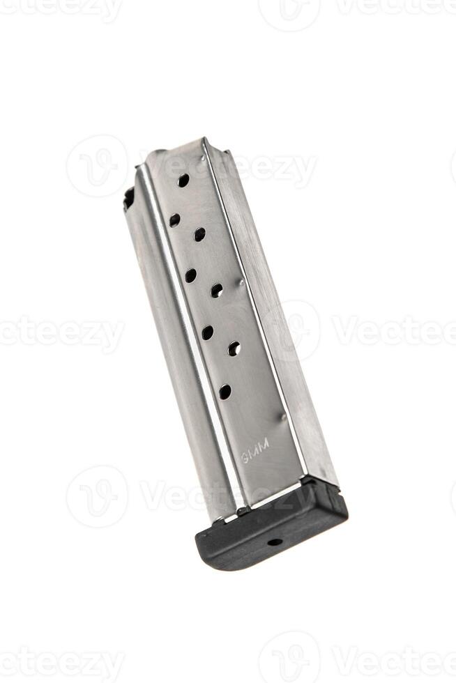 Metal pistol magazine for 9 mm cartridges. Clip for ammunition. Isolate on a white back. photo