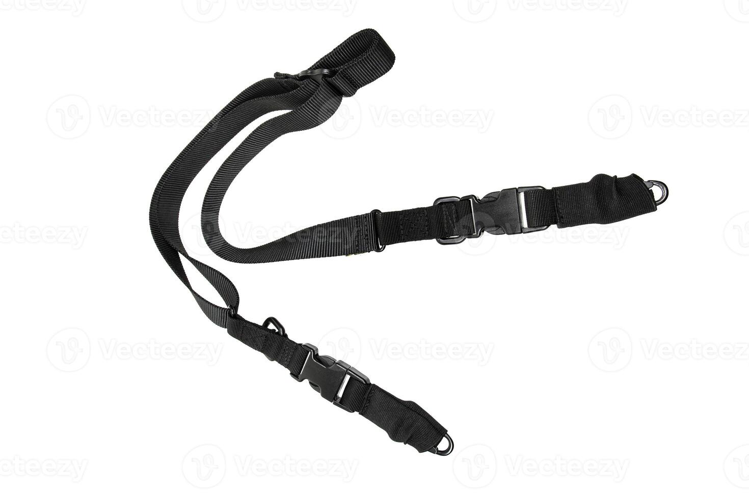 Black adjustable shoulder strap with quick-release buckles and D-rings, suitable for bags or gear, isolated on white back. photo