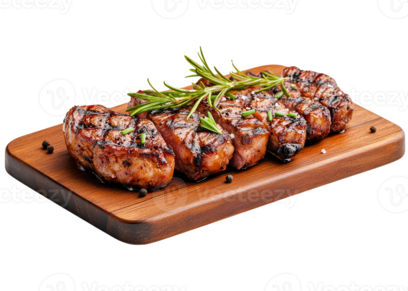 Grilled pork chops on a wooden cutting board png