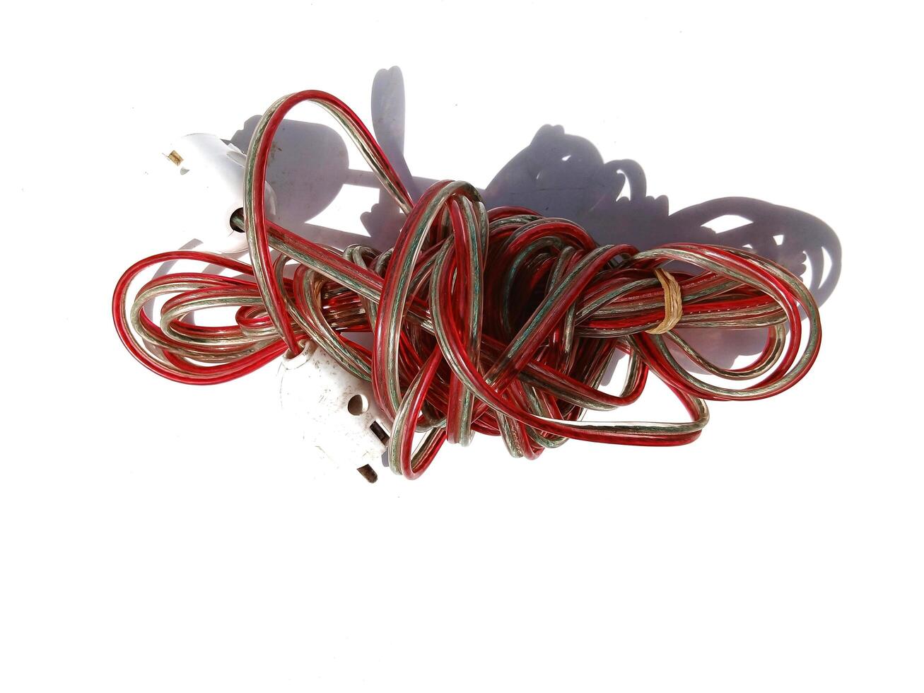 red and white power cables on white photo