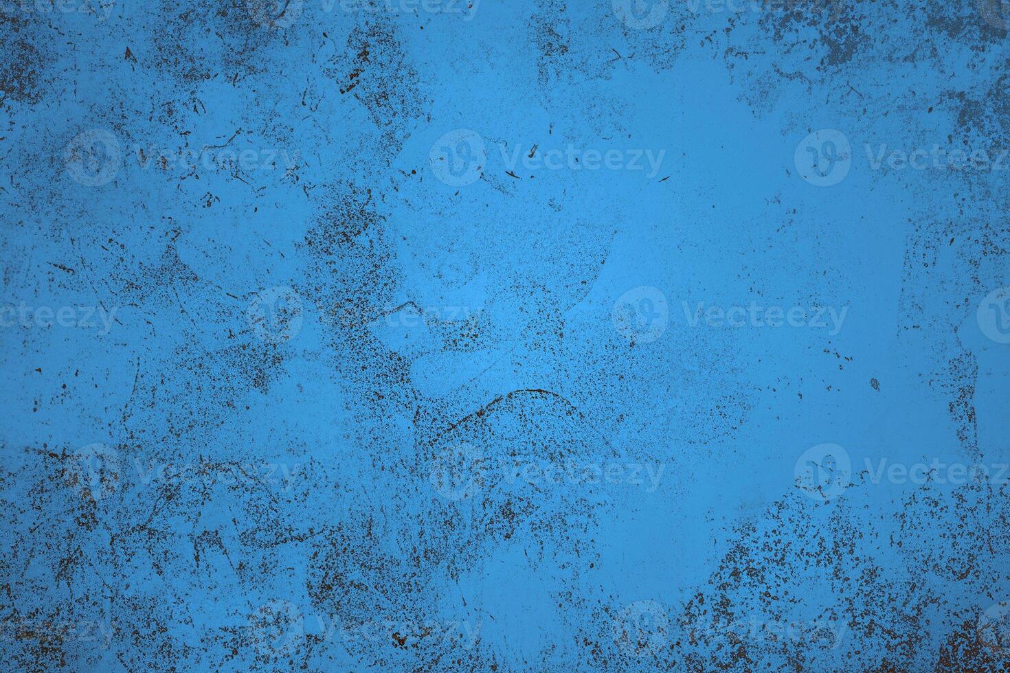 Distressed blue grunge texture with irregular patterns and weathered details, suitable for creative backgrounds. photo