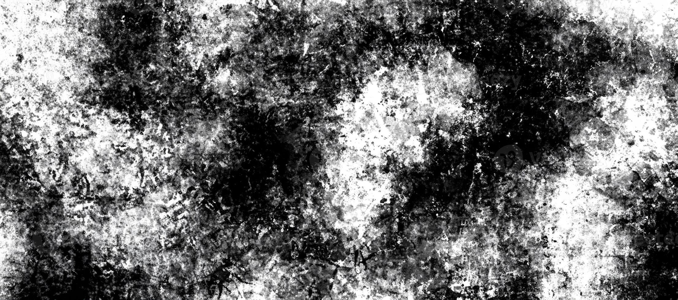 Abstract grunge texture in black and white tones with rough uneven patterns, perfect for design use. photo
