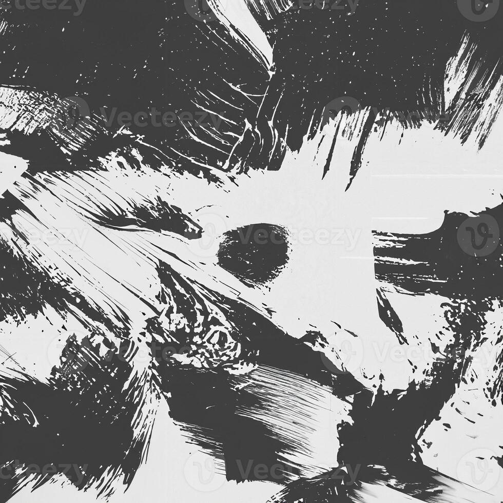 Abstract black and white ink texture featuring bold brush strokes and splattered details, ideal for artistic designs or overlays. photo