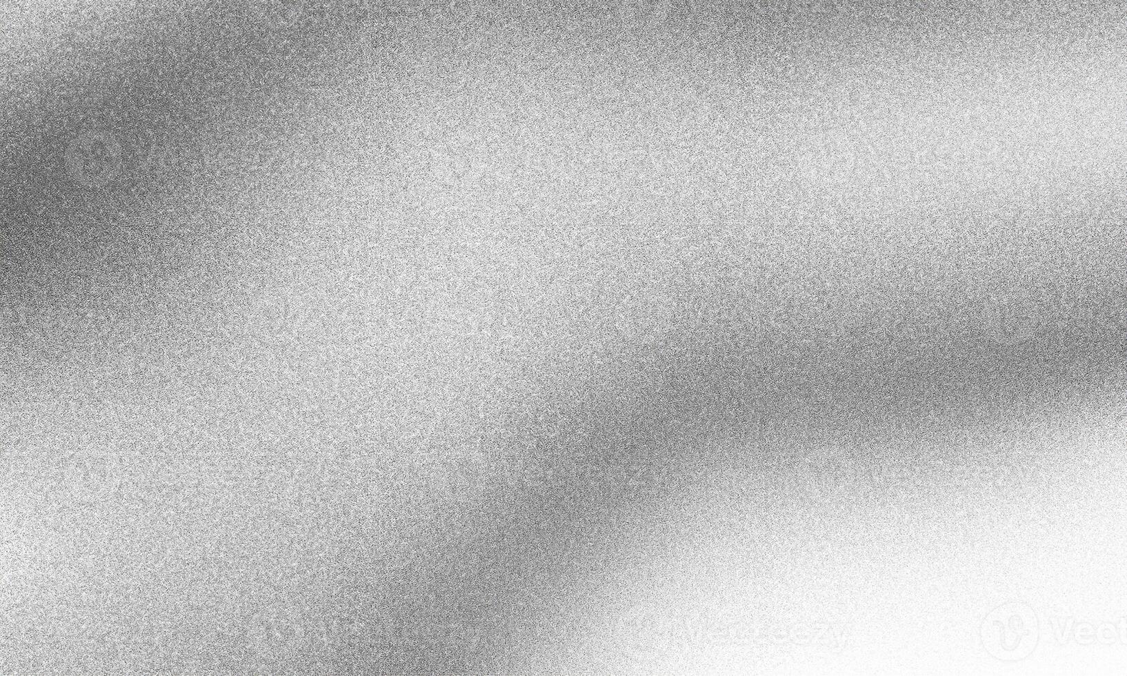 Subtle silver gradient texture with soft grain, perfect for elegant backgrounds and design projects. photo