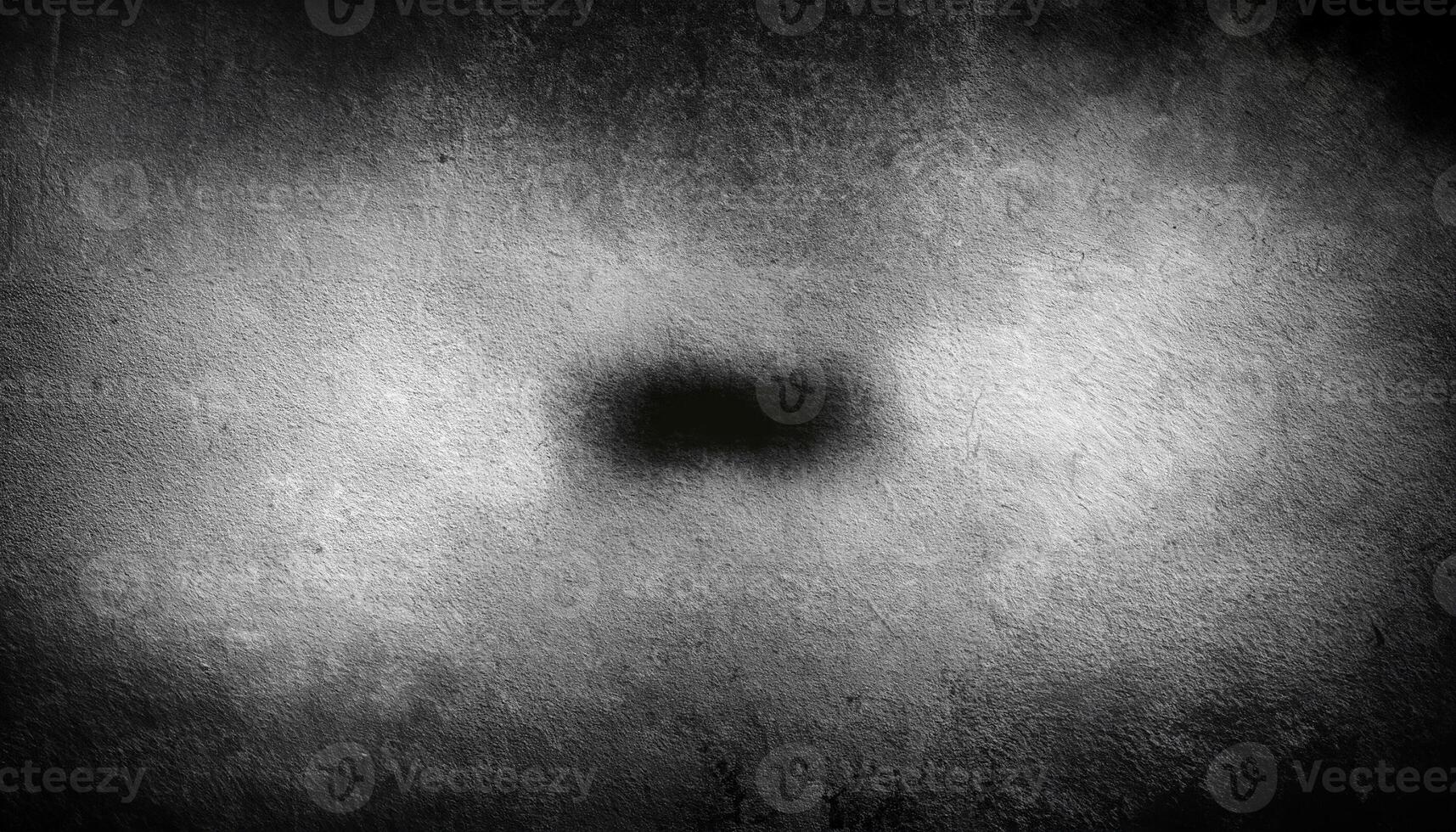 Dark grunge texture with subtle scratches and shading, perfect for use as a background or overlay. photo
