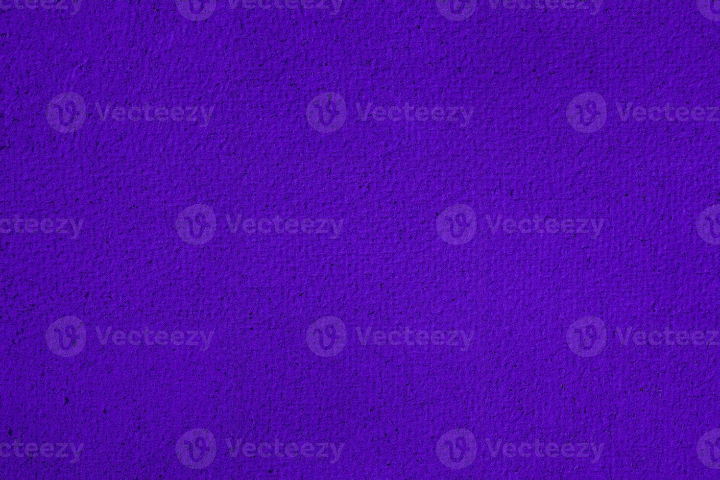Vivid purple textured paper surface, ideal for artistic backgrounds, graphic design, and creative projects. photo