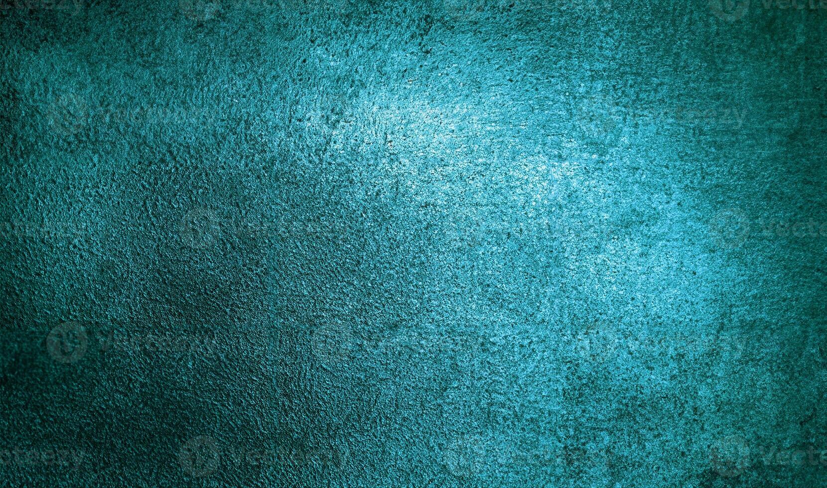 Vibrant turquoise surface texture with subtle grainy patterns, perfect for artistic and design projects. photo