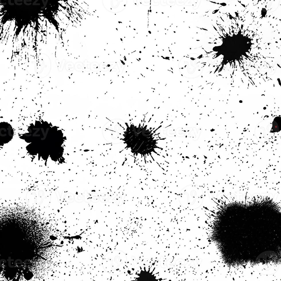Abstract grunge texture with black ink splatters and speckles on a white background, ideal for designs and overlays. photo