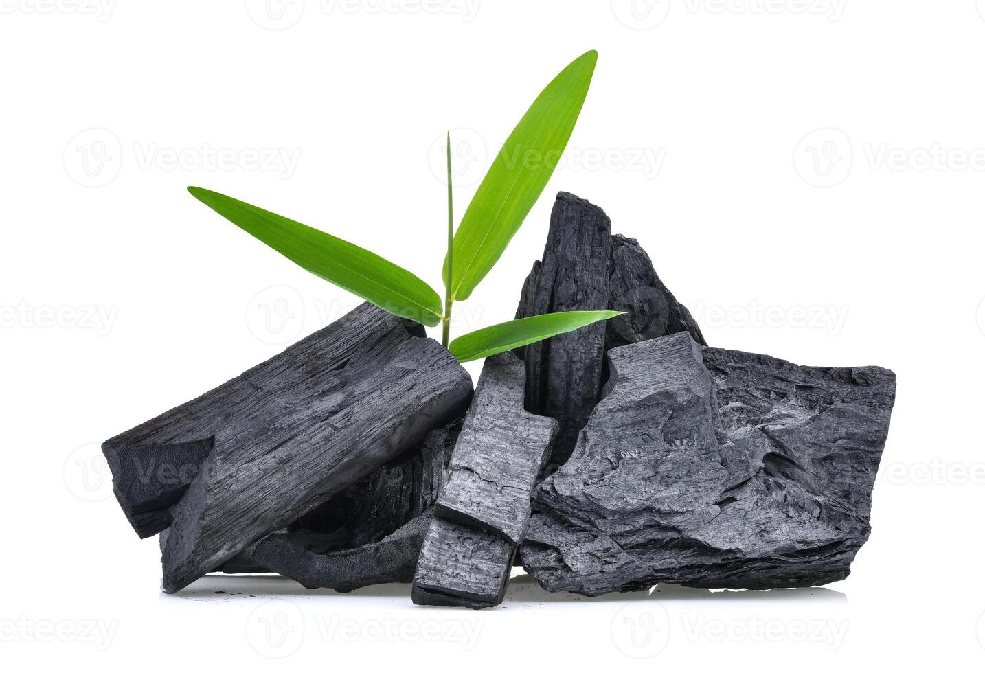 Natural wood charcoal isolated on white background photo