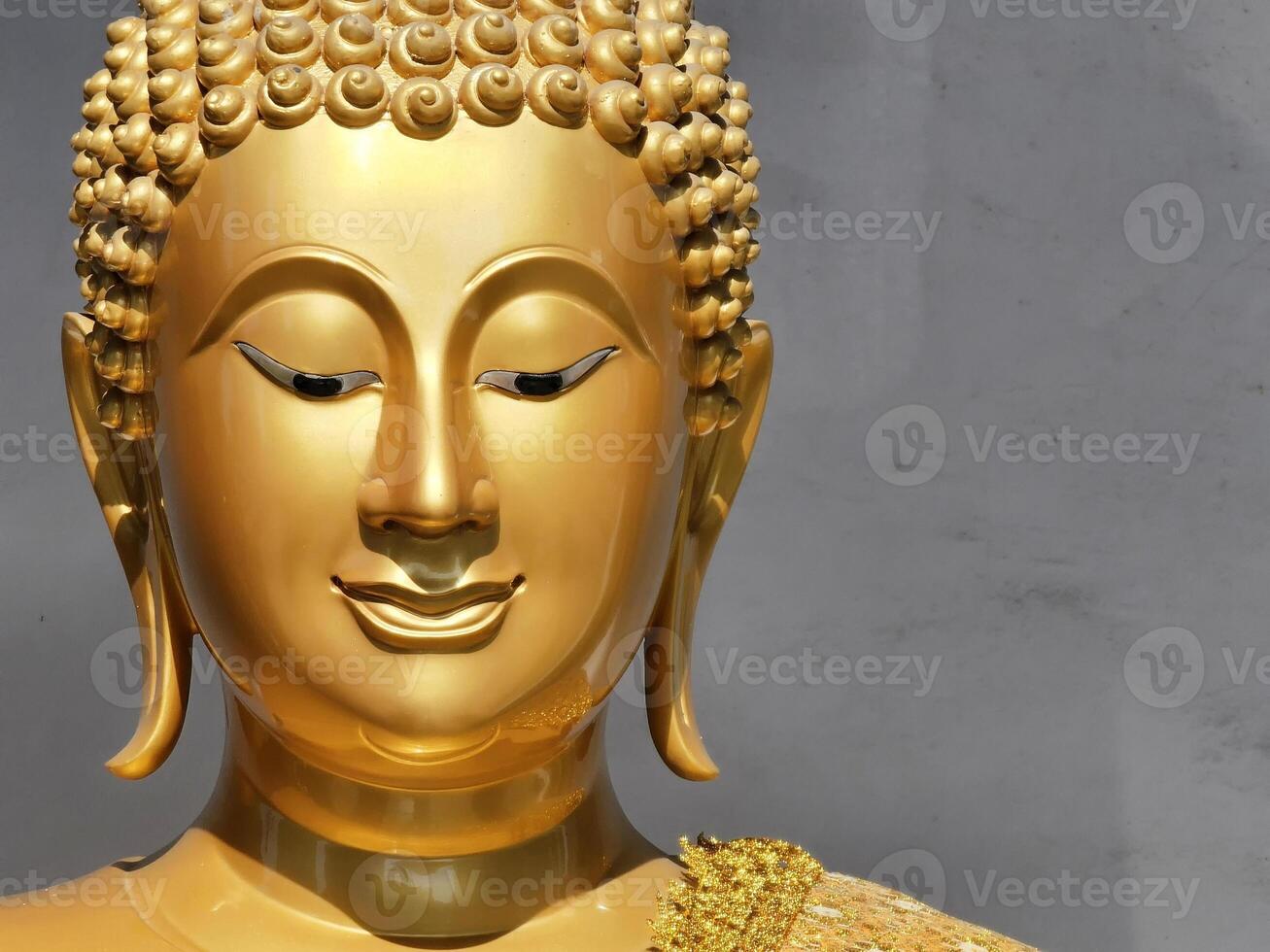 Close up Golden Buddha Image. photo