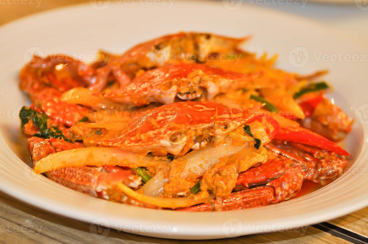 curry crab , stir fried crab with onion photo