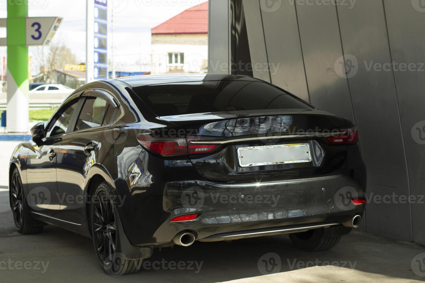 The car in the city. Vehicle on the street. Car on asphalt. photo