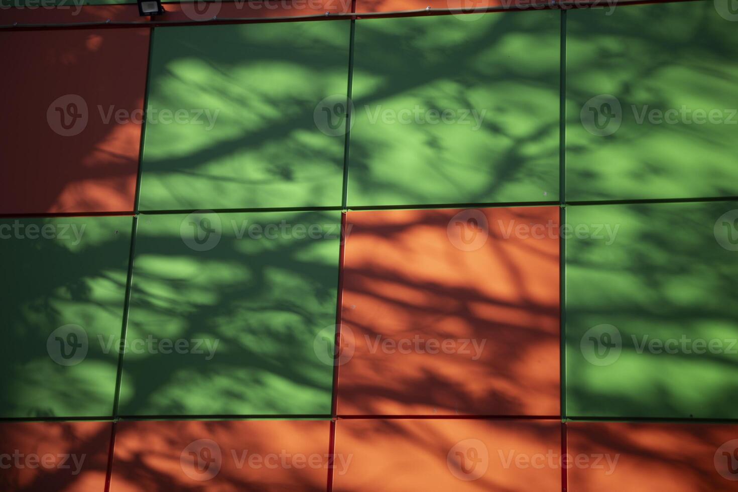 Shadow on the wall. Building detail. Supermarket in detail. photo