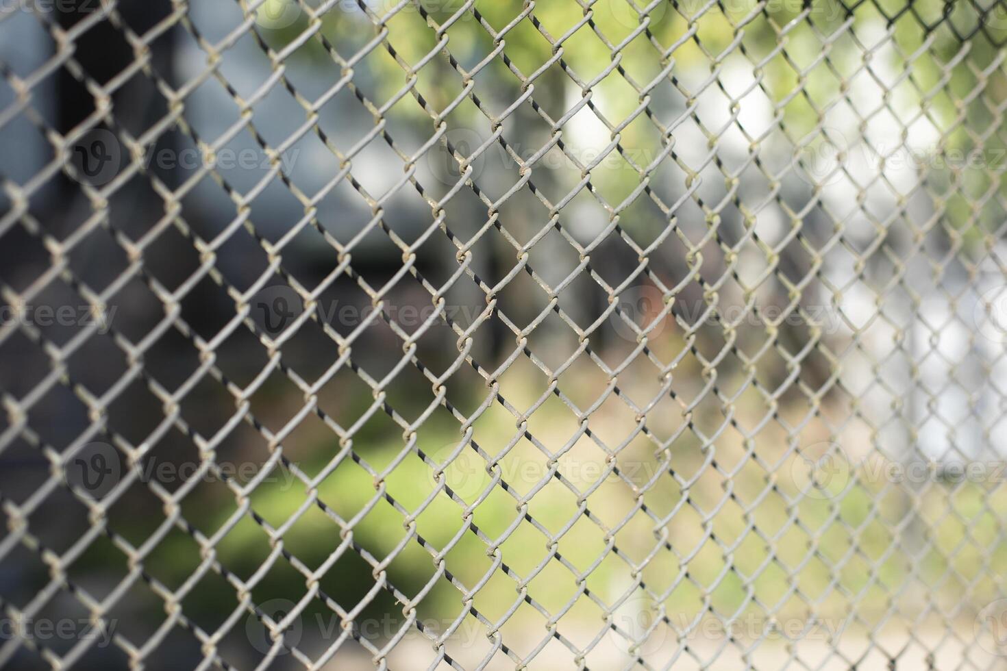 Lattice fence. Steel grating. Steel mesh. Repeating element. photo