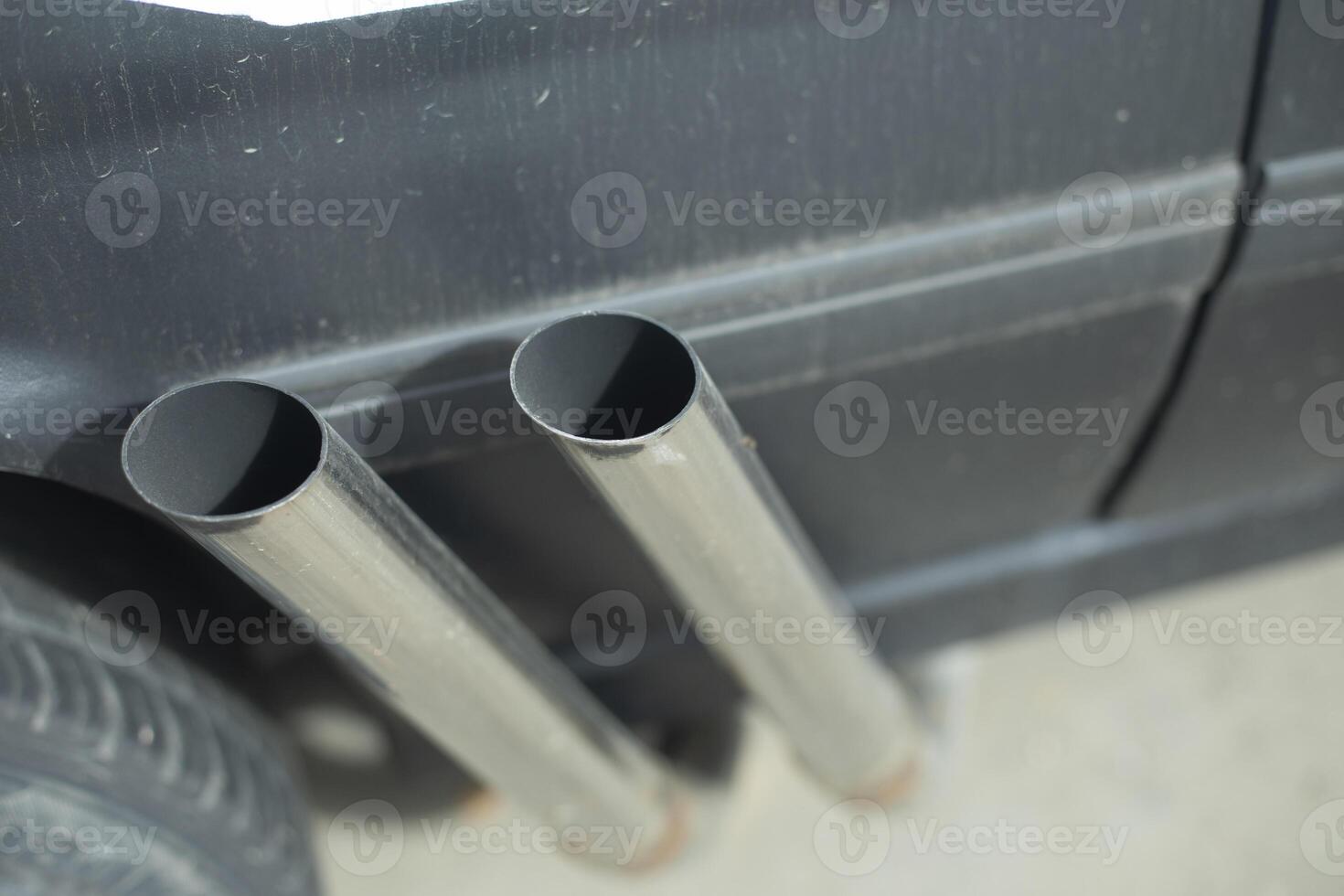 Sports car exhaust pipe. Details of sports car. Exhaust pipes. photo