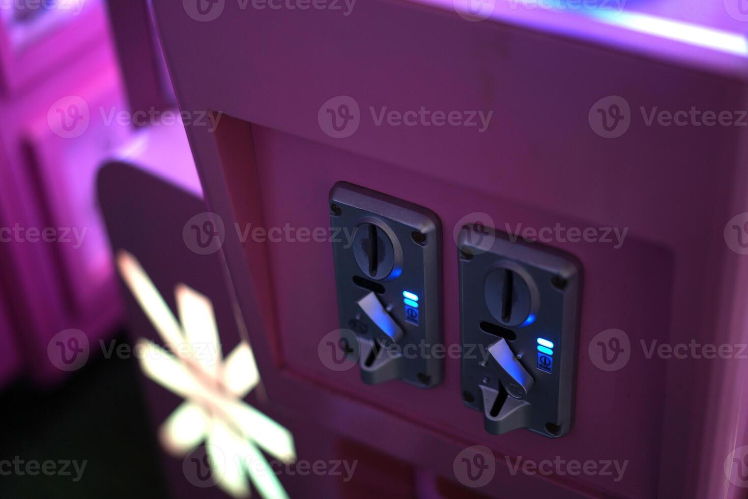 coin slot for arcade game photo